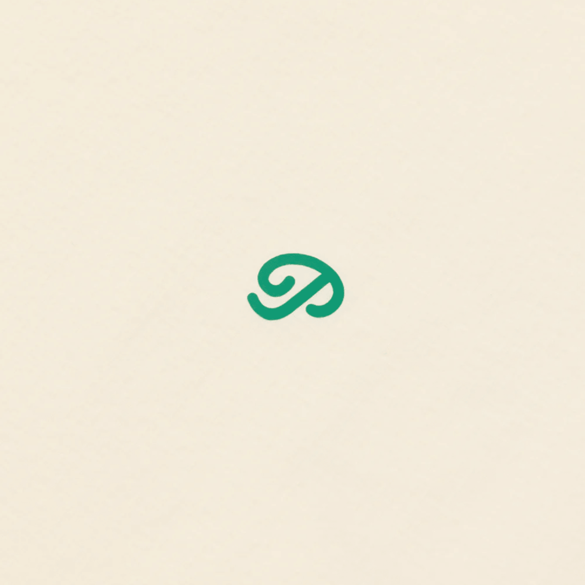 Close-up of the cream shirt’s logo.