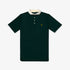Green polo shirt with white collar and yellow logo.
