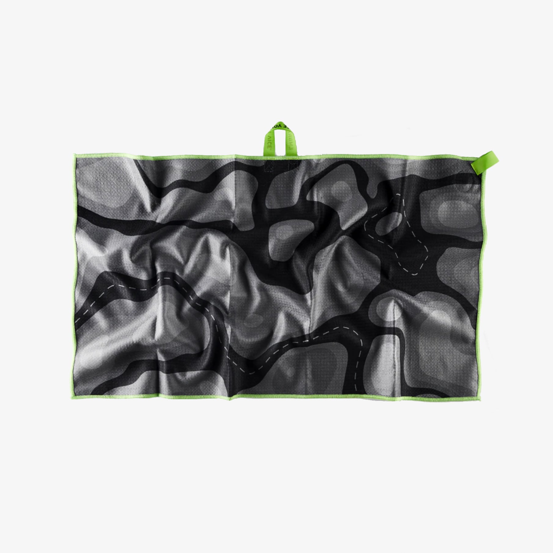 Black and gray camouflage-patterned towel with green edges on a white background