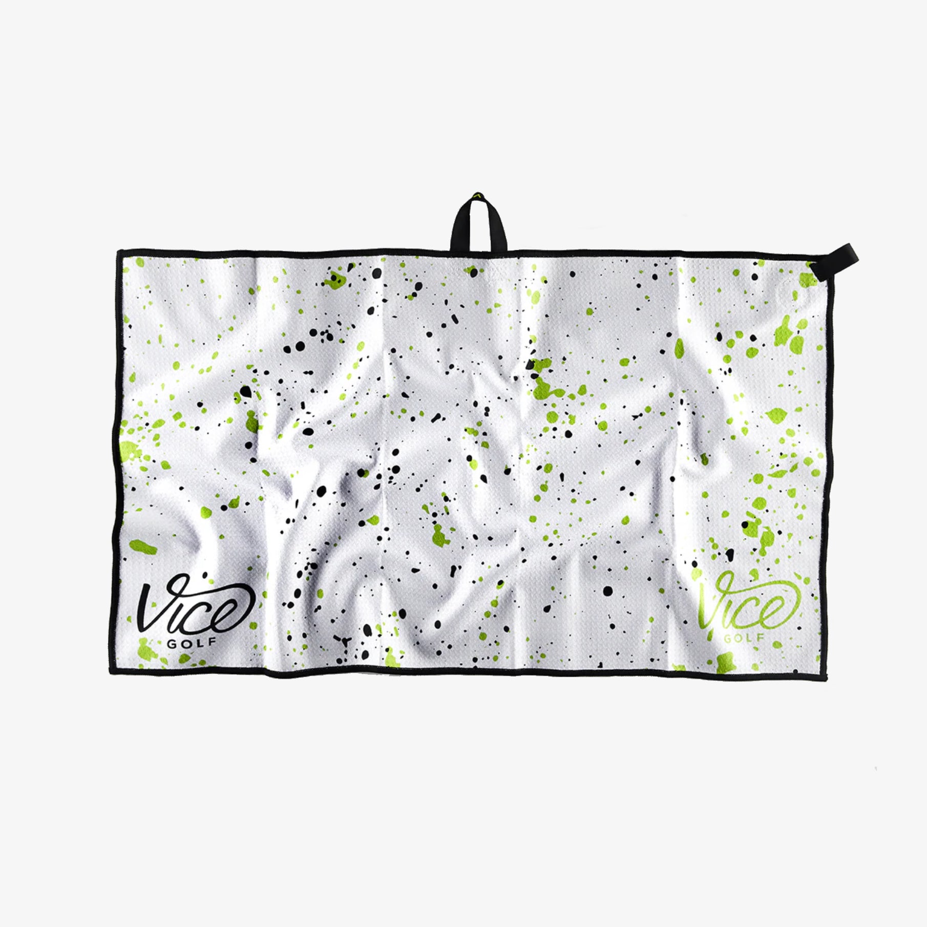 White towel with green and black speckles and 'Vice' branding on a white background