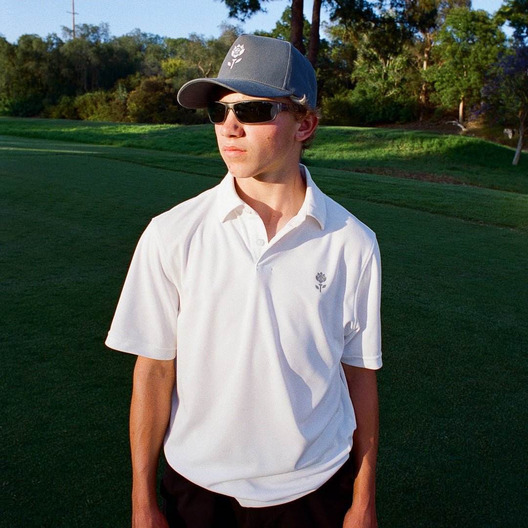 Man wearing Men's Polo - White - Erthe Golf 